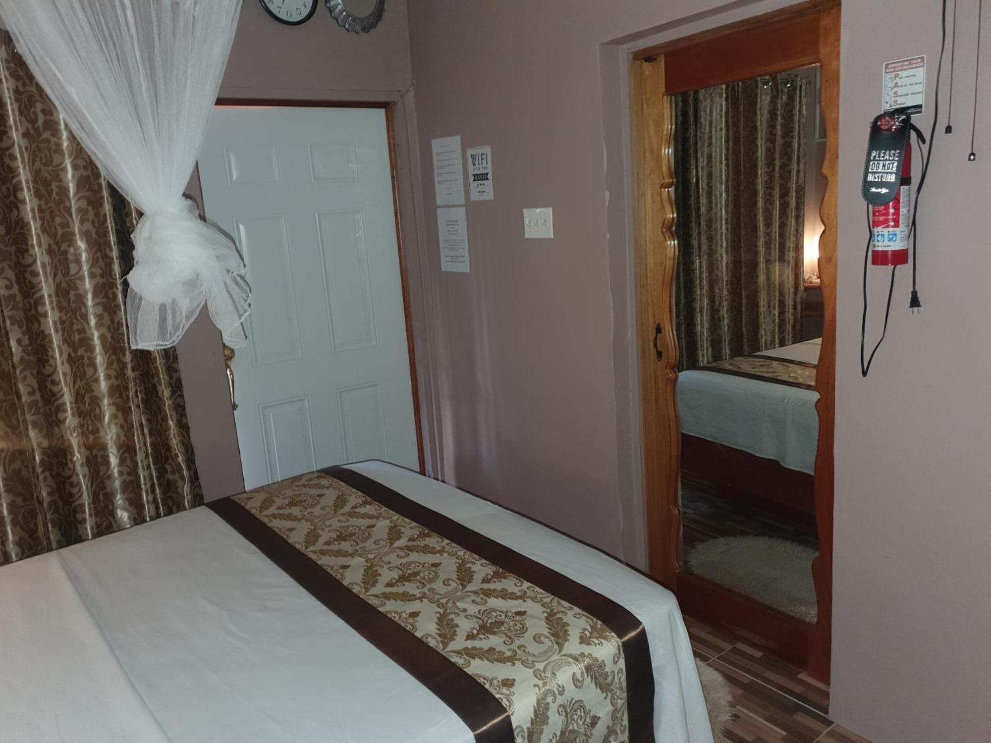 Mesmerize Guest House Порт-Антоніо Номер фото